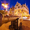 SmugMug > keywords > curacao > Evening shot of a cannon with Dutch architecture in Punda, Willemstad, Curacao, Netherlands Antillies